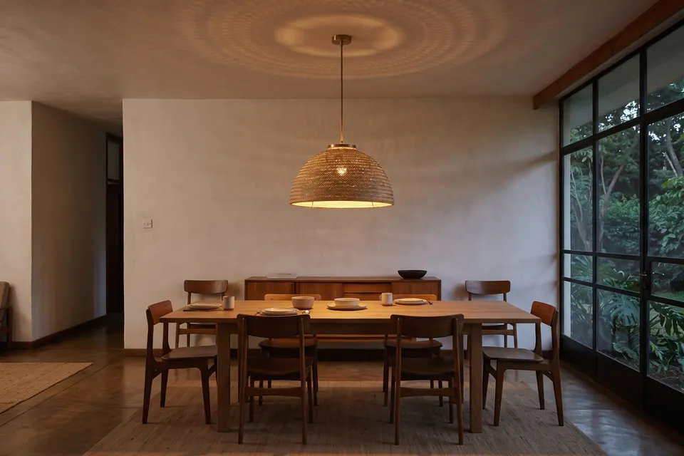 Kikapu pendant lamp, shown in a room for scale.