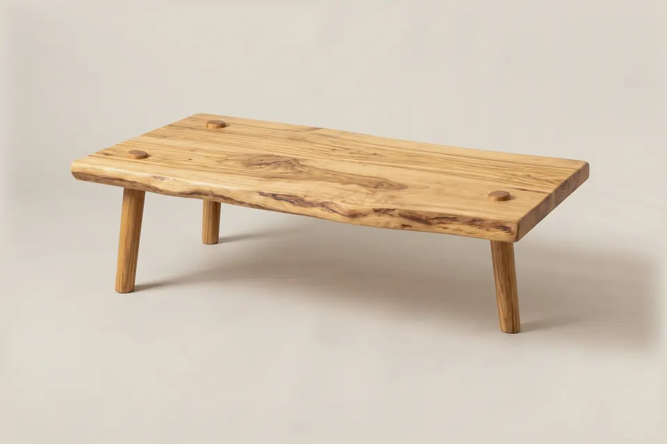 Kokwet low table, 2020. Olive wood.