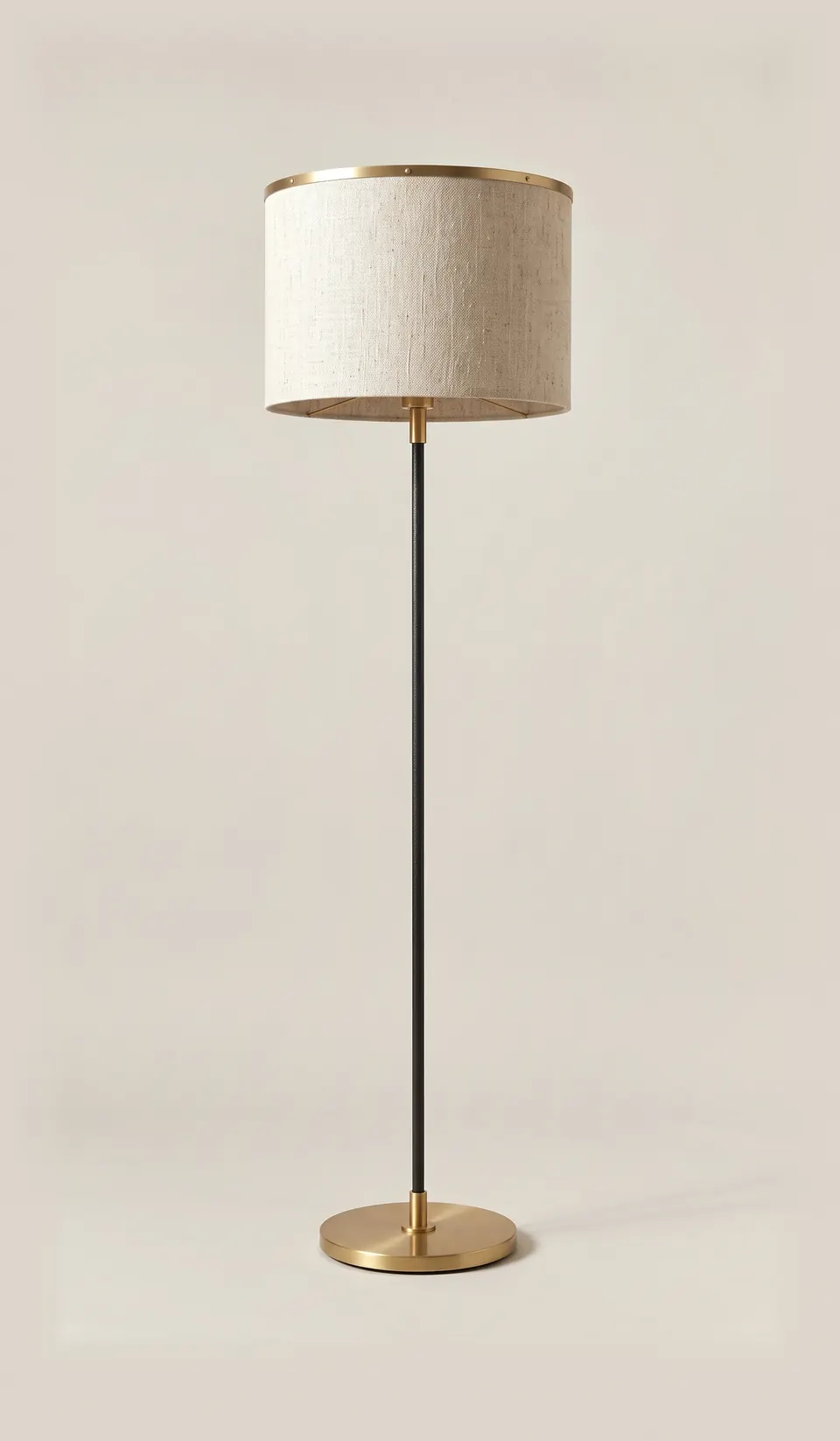 Mnara floor lamp, 2023. Blackened steel, brass and linen.