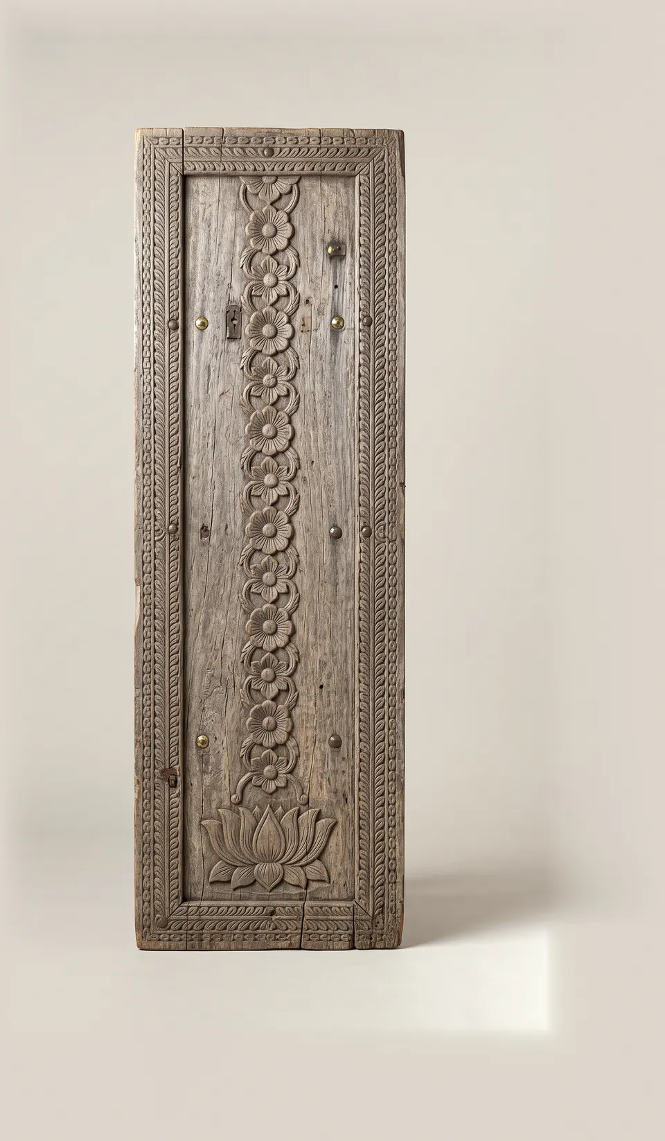 Carved door panel, Late 19th century. Carved hardwood.